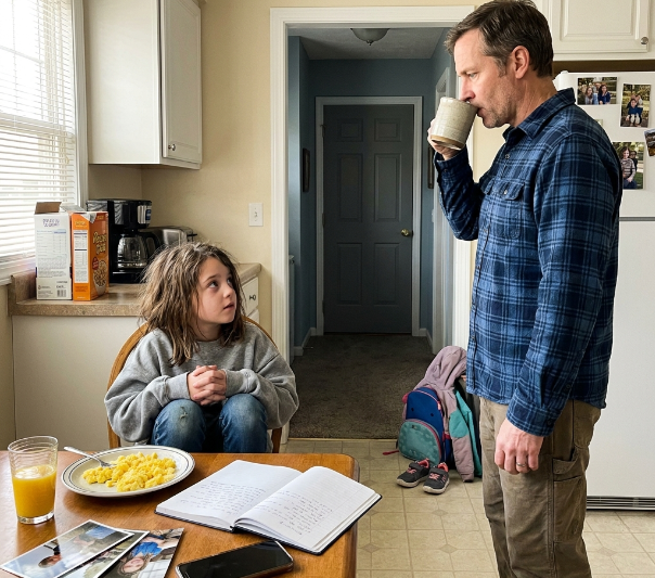 THE FIRST MORNING, SHE SAT IN FRONT OF A PLATE OF EGGS WITH BOTH HANDS IN HER LAP AND ASKED, “AM I IN TROUBLE?”